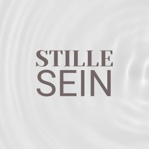 Wasserringe auf einem sandigen Grund